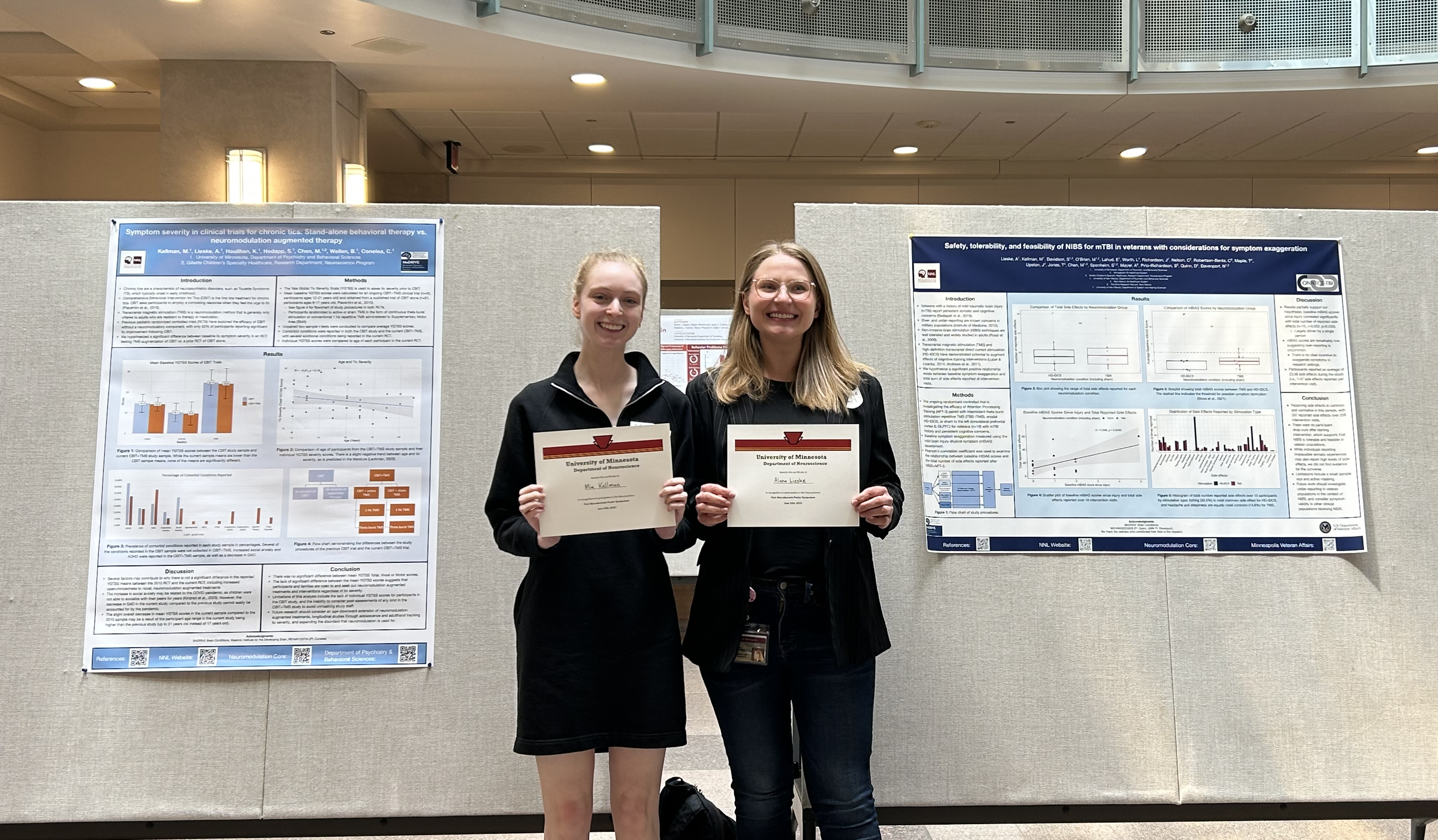 Alana and Mia stand with their awards at the 2023 MINDS symposium